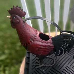 Roosters one metal and the other is a door stopper